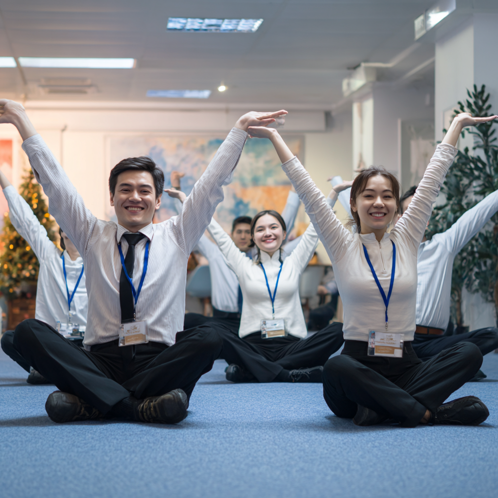 Smiling Kazakh woman in her 30s practicing yoga in a serene studio environment with soft natural lighting